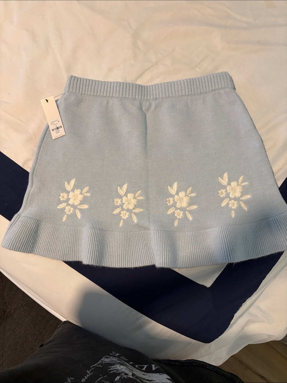Francesca's Collections Baby Blue Knit Mini Skirt with White Floral Accents